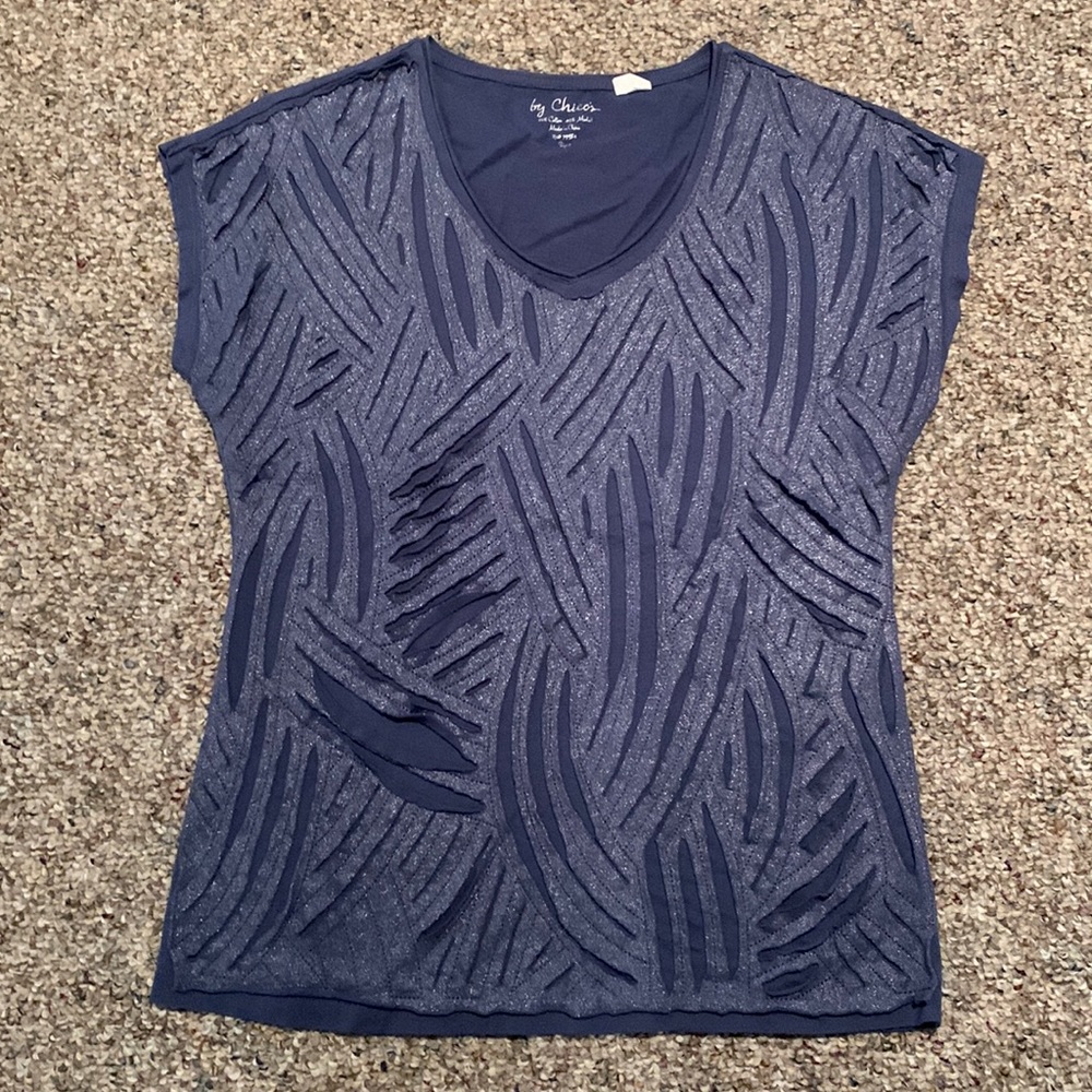 Chico’s top with cap sleeve. Purple geometric pattern. Size 0.